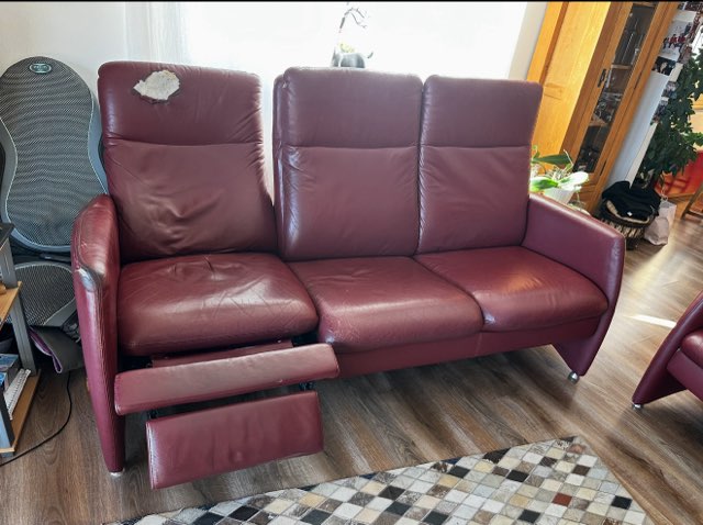 Fauteuil en cuir avant restauration